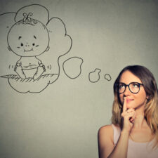 woman dreaming about having a baby