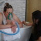 woman-in-labor-using-nitrous-oxide-for-labor-pain-relief-birth-center