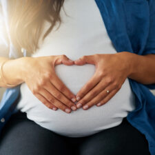 pregnant-mom-making-heart-over-her-belly