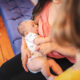 mother-nursing-newborn-with-lactation-consultant