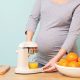 Expecting mother makes natural orange juice