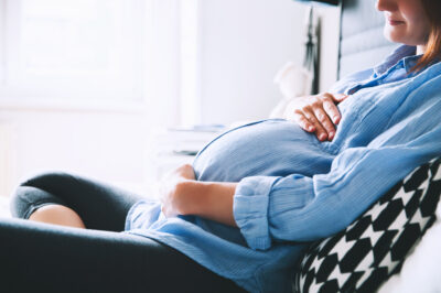 Beautiful pregnant woman at home