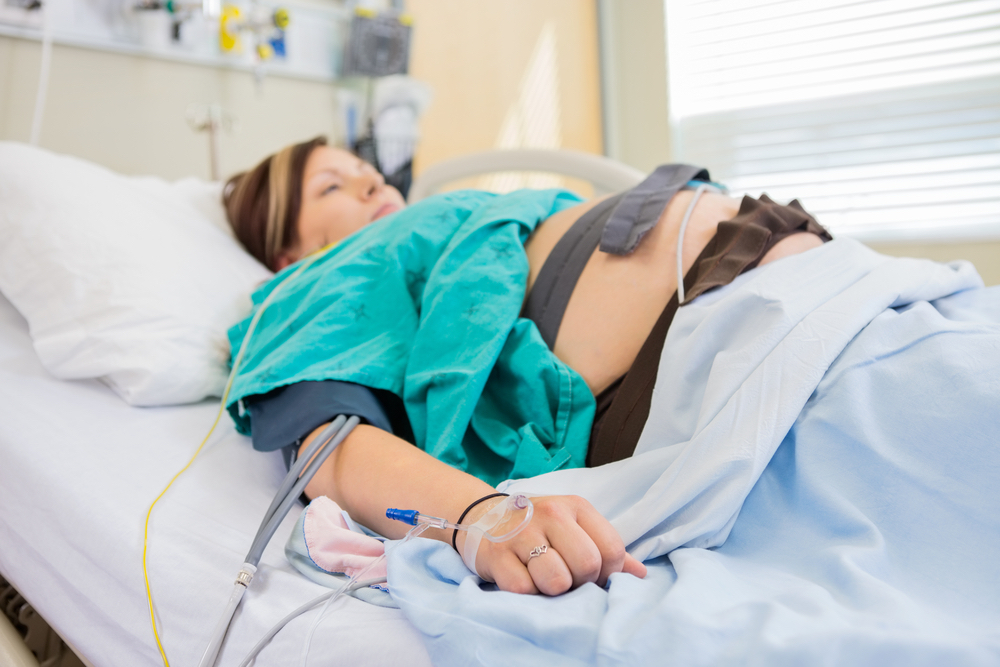 woman in labor with I